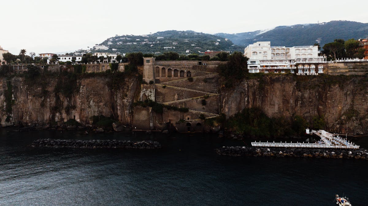 Narrow coastal walking path on Capri with sea views and limestone cliffs