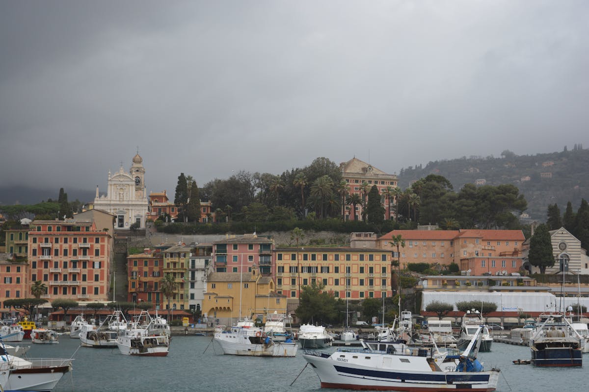 Colourful boats and buildings at Marina Grande harbour in Capri